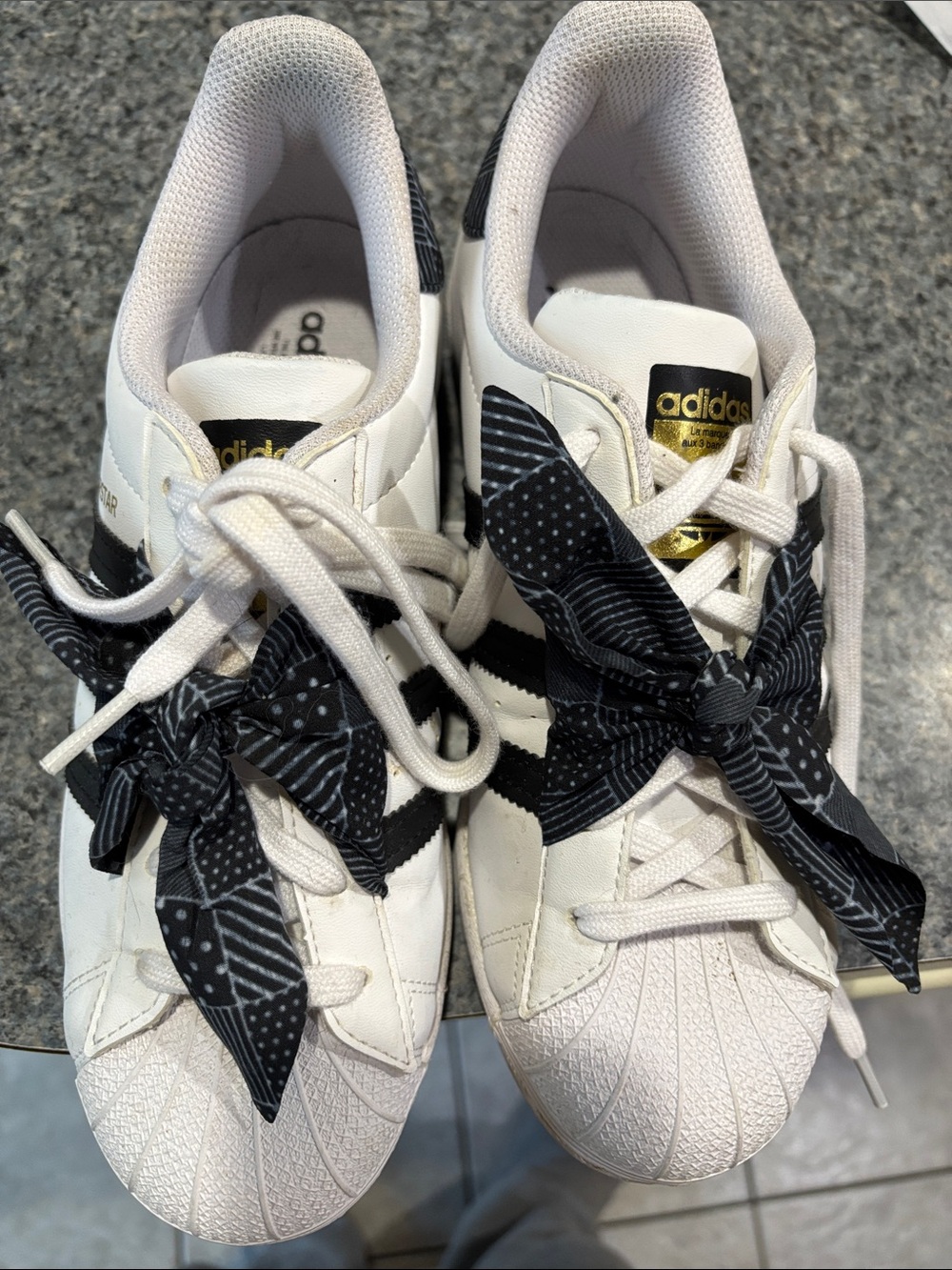 adidas White & Black Superstar Sneakers with Gold Tongue Logo